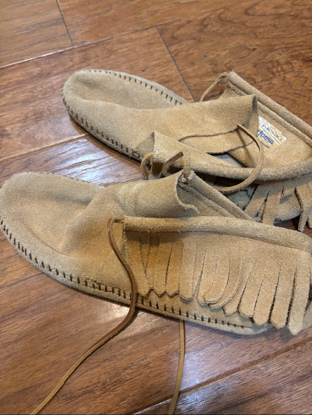Minnetonka Suede Fringe Ankle Boots in Tan